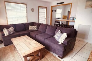 Plenty of seating for lounging while you're not at the beach. Take a break from the sun and chill out in this comfy living room