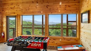 Play foosball or cornhole in the lower-level living soace