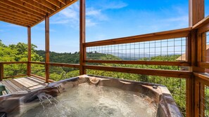 Dive into relaxation with the backdrop of a serene mountainscape