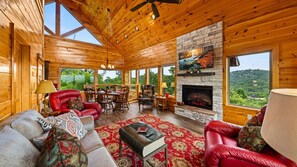 Warm up by the fire & lounge comfortably in the main floor living room