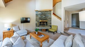 Main Floor - Living Area With Wood Burning Fireplace