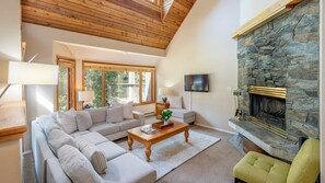 Main Floor - Living Area With Wood Burning Fireplace