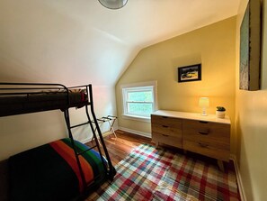 Secondary bedroom upstairs with dresser full bottom and twin top bunk