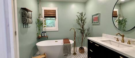 Spa like bath downstairs with luxurious soaking tub