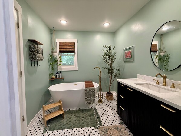 Spa like bath downstairs with luxurious soaking tub