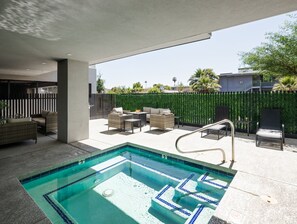 Communal Area: Hot tub, complete with a dining area, fire pit, sun loungers and BBQ grill.