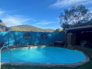 Outdoor pool available for guest use - heated through summer months.