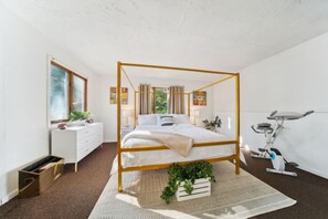 The master bedroom has a roomy and comfortable king bed.