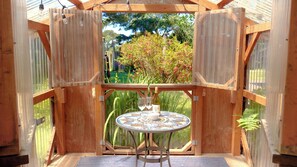 Shelter next to hot tub for your smoking/hanging desires.