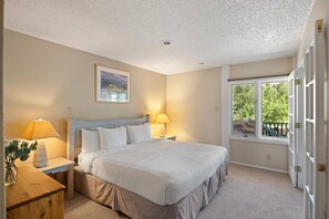 The private bedroom features a comfortable king bed.