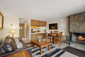 This cozy one bedroom offers the conveniences of home with a full kitchen, comfortable living room, dining space and a flat screen TV.