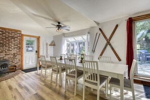 Bright and airy white dining area that offers a clean, elegant space for meals and gatherings.