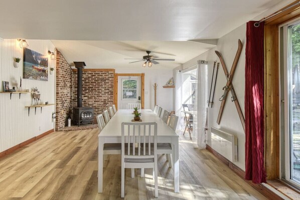 Stylish wood and white dining area that blends natural warmth with modern elegance — perfect for shared meals and conversations.