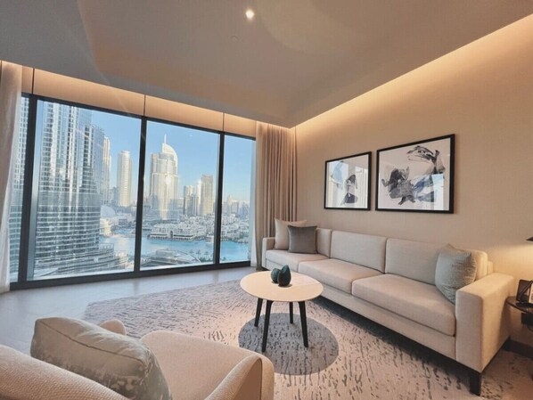 Spacious 3-bedroom holiday home in Dubai's Opera Tower 1, featuring modern decor and stunning floor-to-ceiling windows with breathtaking views of the city skyline. Ideal for vacation rentals, short-term stays, or monthly accommodation in Downtown Dubai.