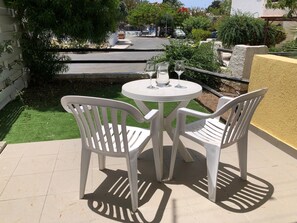 Private patio and garden 50m from communal pool