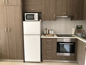 Stove, microwave, oven and fridge