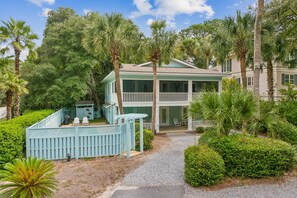 Nestled on a quiet street with private beach access just steps away, this spacious retreat is perfect for memorable multi-generational gatherings and fun times with friends.