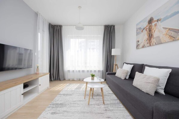 Living room with dining table and chairs.