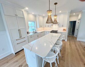 Kitchen with 8' island and built-in GE monogram appliances