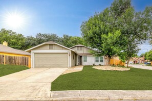 Front view of the property with ample parking space