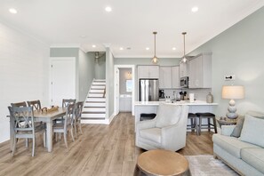 Spacious open-concept living area, perfect for gathering and entertaining