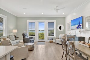 Relax in our spacious open-concept living room, equipped with a smart TV and fast WiFi—perfect for streaming and staying connected.
