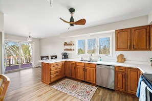 Spacious kitchen with lots of natural light and beautiful views.