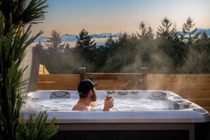Private hot tub with a view of the Olympics