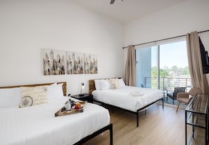 2nd Floor: Primary Bedroom featuring 2 Queen Beds, a Smart TV, a private balcony, and an ensuite primary bathroom.