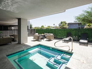 Communal Area: Hot tub, complete with a dining area, fire pit, sun loungers and BBQ grill.