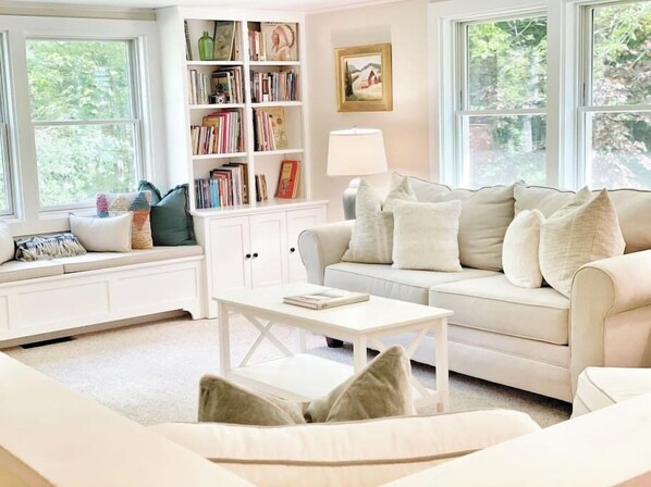 Quaint cozy three bedroom with large deck on river (415)