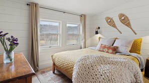 cozy bedroom on the second floor with queen size bed