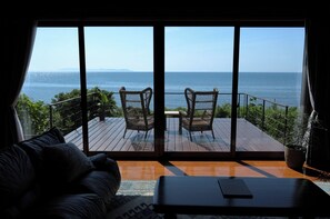The sea can be seen from the living room