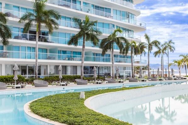 Lots of seating and lounging options near the pool