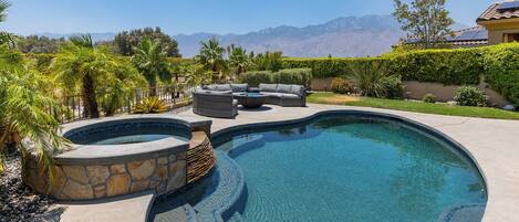 Sparkling saltwater pool and integrated waterfall spa