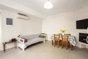 Living Room with Sofa Bed and TV