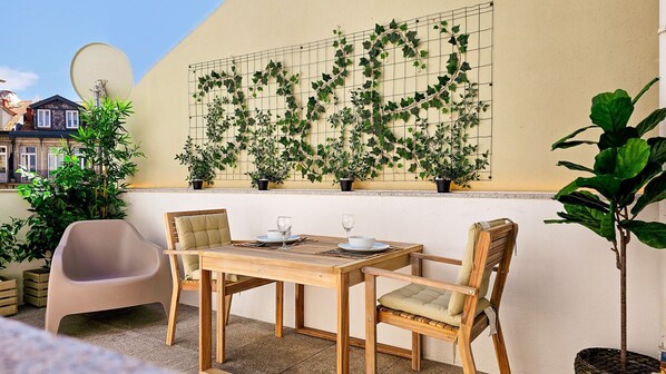 Lovely outdoor furniture where you can enjoy your meals or a glass of wine! #Balcony #LovelyStay