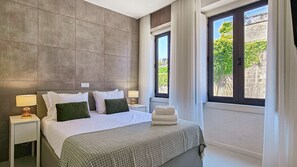 Bright bedroom with a double bed and comfortable mattress. #Comfort #Airbnb