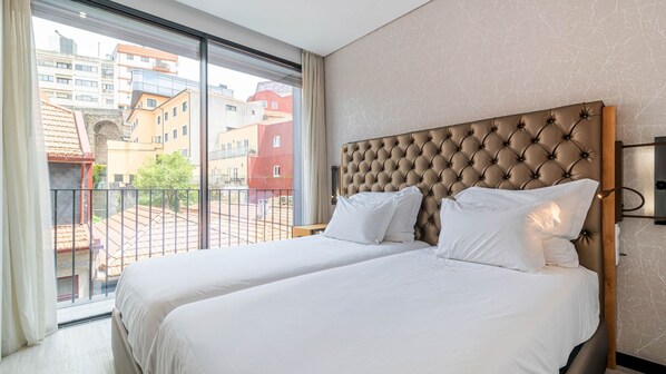 Bright bedroom area with cozy mattresses and linen! #bedroom #airbnb