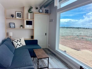 Living area, which includes sofa bed