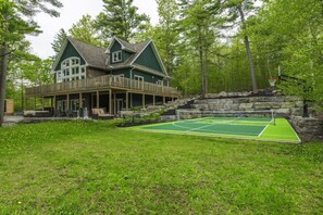 Welcome to Greenstone Manor, where a championship-sized pickleball and badminton court awaits your next game!