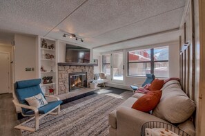 Living Room with Gas Fire Place and Reading Nook. Login to all your favorite streaming services on a Roku TV