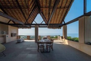 Shared roof top palapa