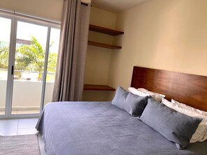 Beautiful views with sliding doors in master bedroom.