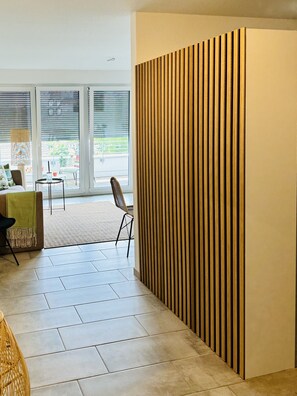 Sleeping area on the right (with wardrobe as room divider)