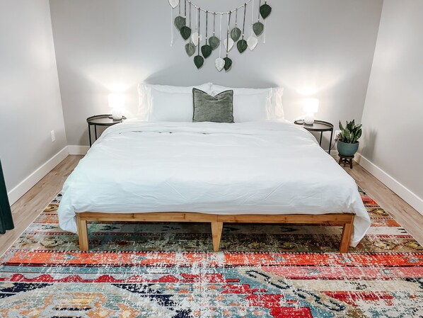 King bed with memory foam mattress and organic cotton sheets