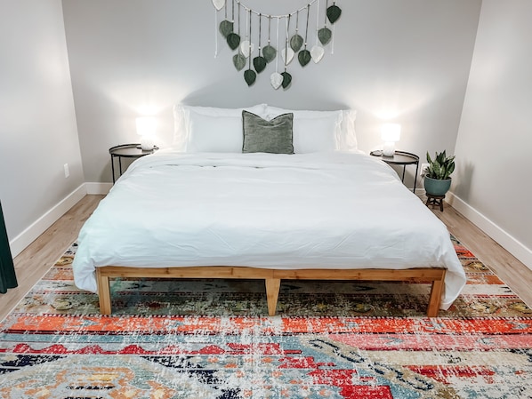 King bed with memory foam mattress and organic cotton sheets