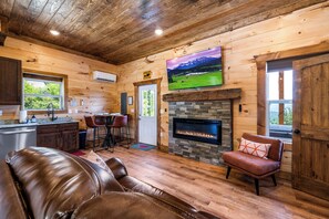 Comfortable Living room with Leather power recliners.