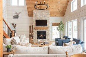 Living room with seating for 8 & propane fireplace