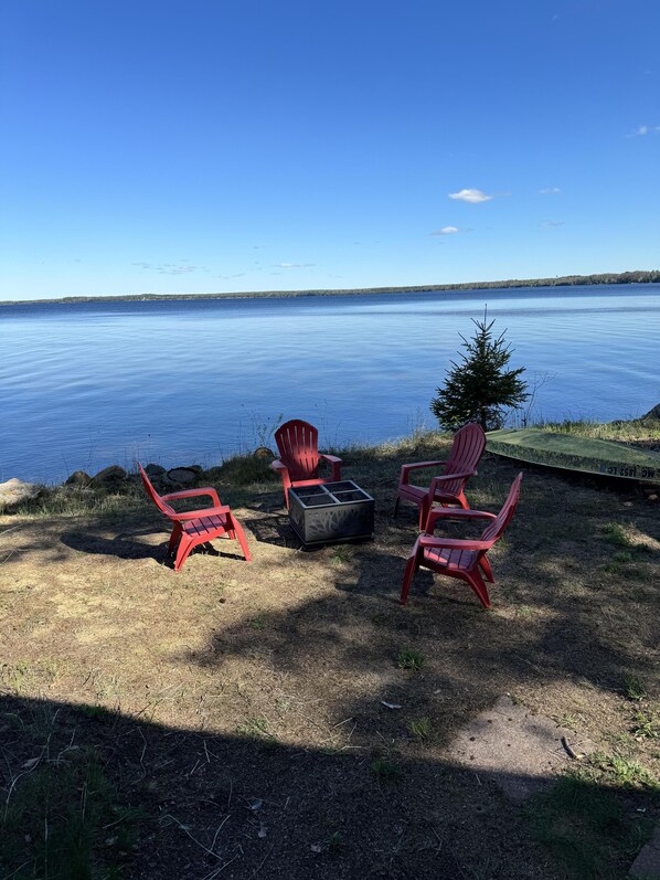 fire pit and view of black lake